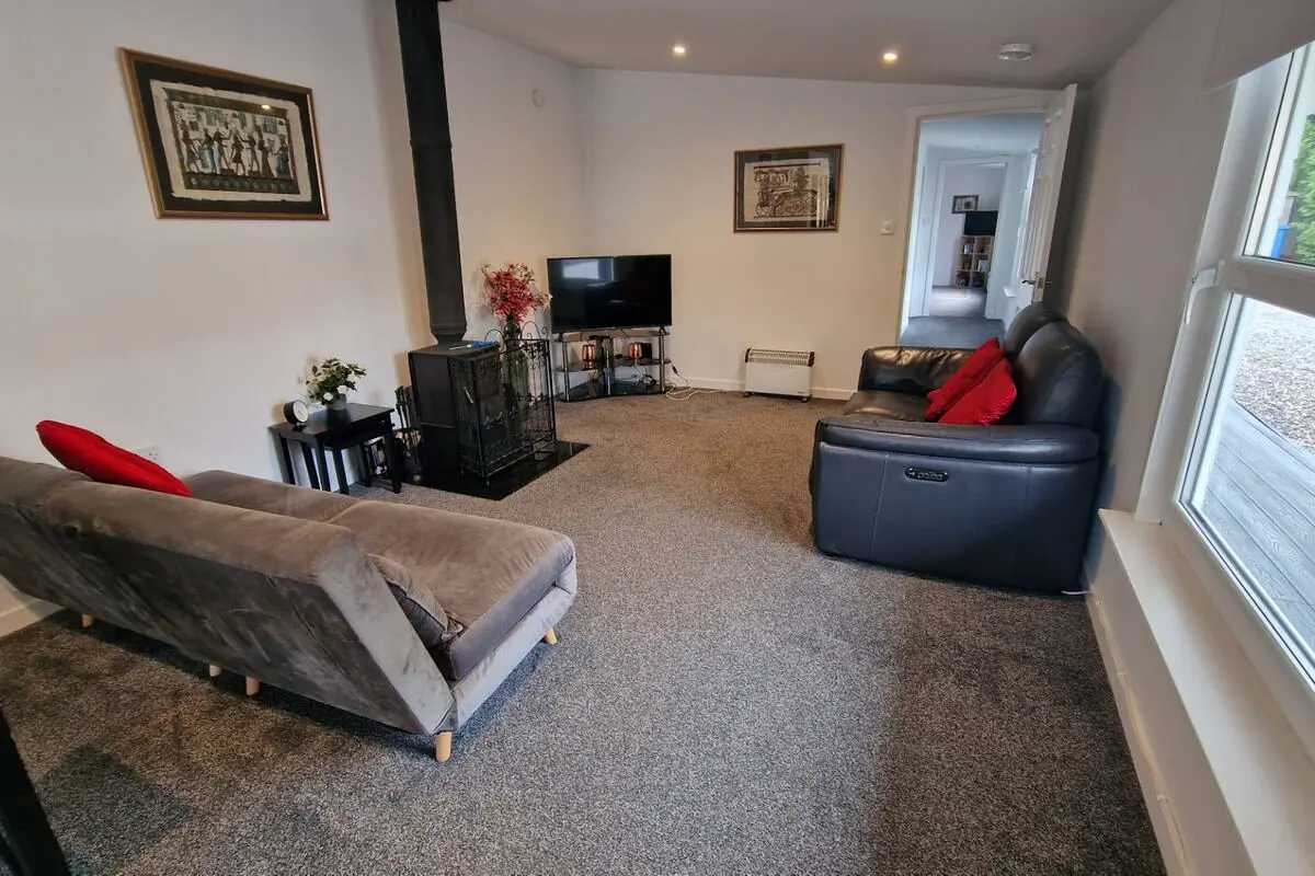 Lounge with log burner — Meadows 1